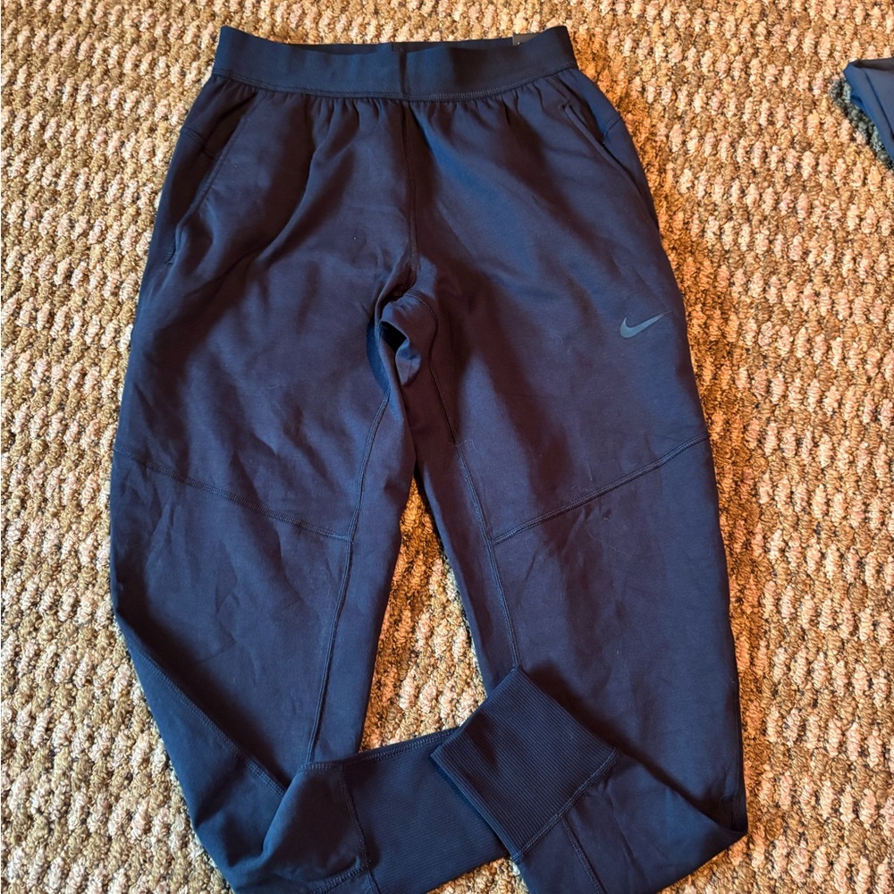 NWT Men’s Nike lined joggers. Size S black.